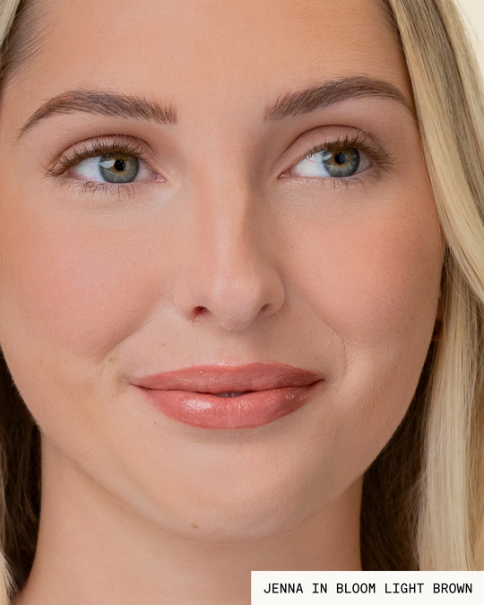 Model Jenna with blonde hair and light skin wearing Bloom Pop-On Lashes: The Extensions Set in light brown