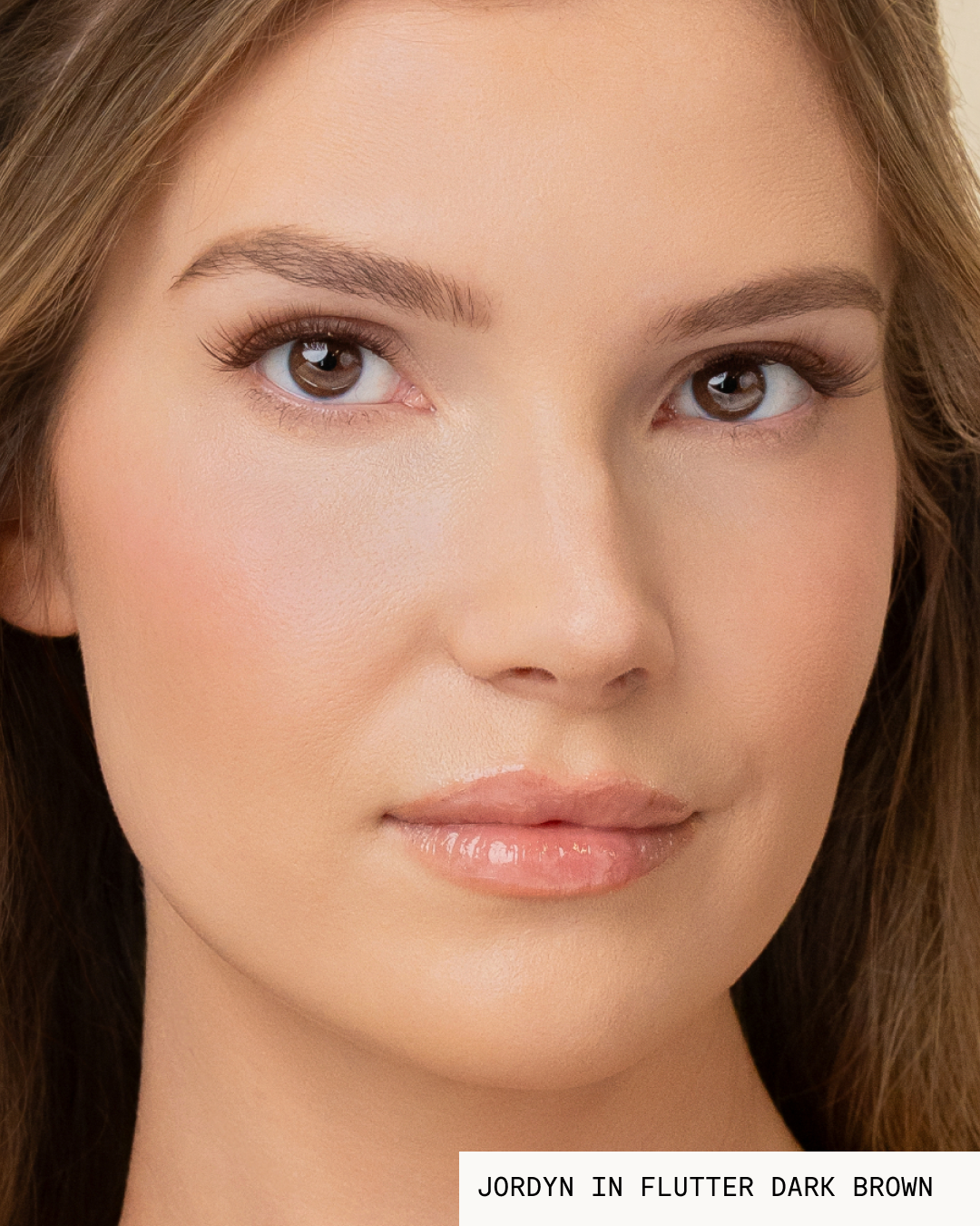 Model Jordyn with brown hair and light skin wearing Flutter Pop-On Lashes: The Extensions Set in dark brown
