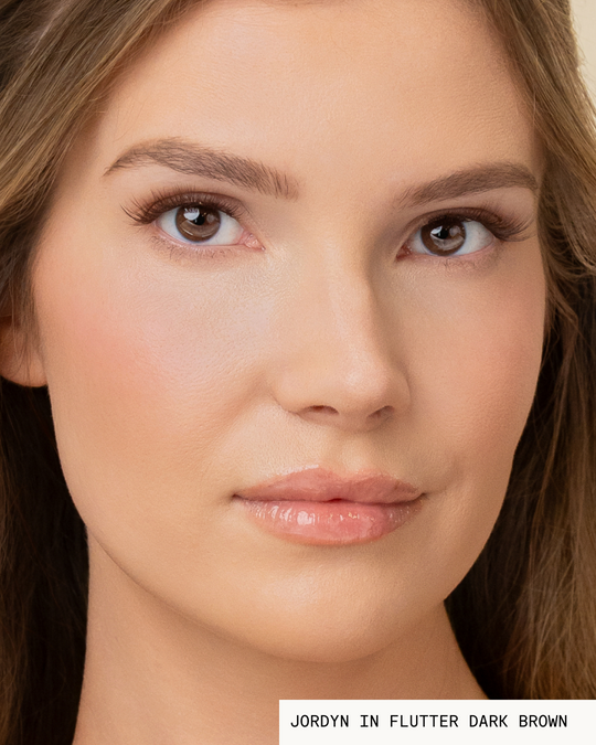 Model Jordyn with brown hair and light skin wearing Flutter Pop-On Lashes: The Extensions Set in dark brown