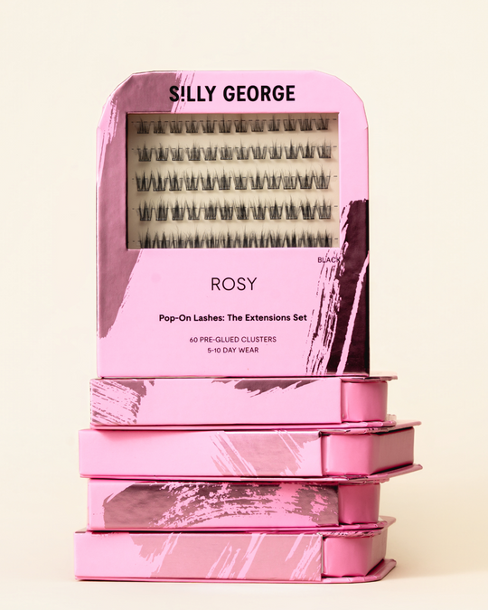 Stack of black Rosy Pop-On Lashes: The Extensions Set packages