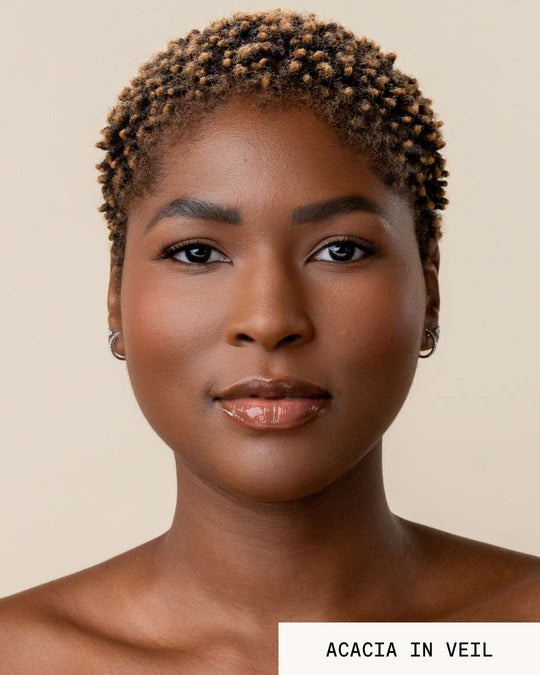 Model Acacia wearing lip gloss revival veil